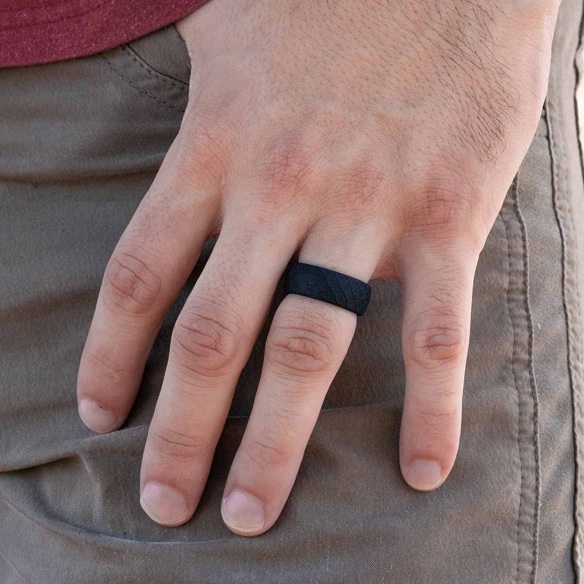 Silicone ring with textured design on a male hand
