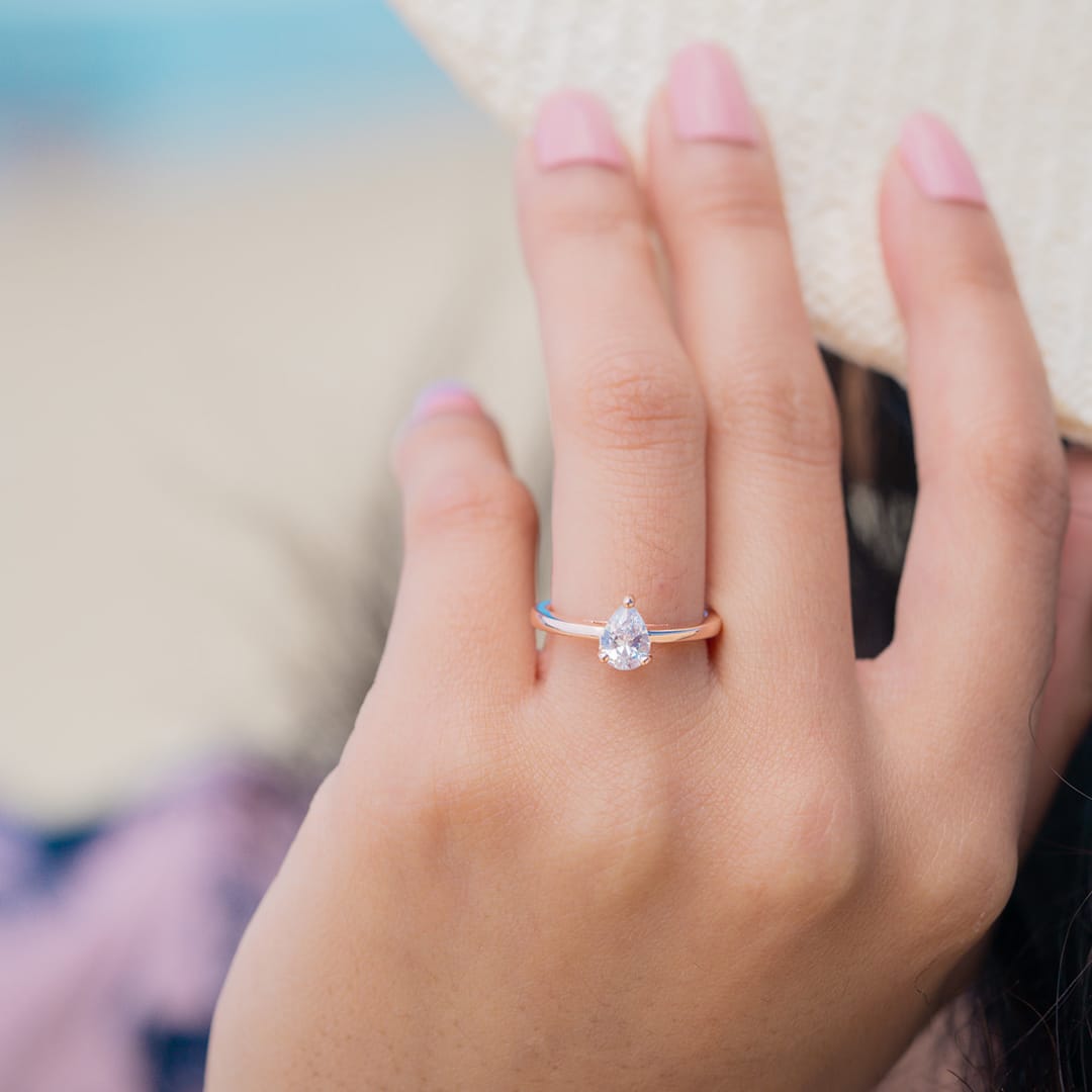 the daisy rose gold pear cut wedding ring