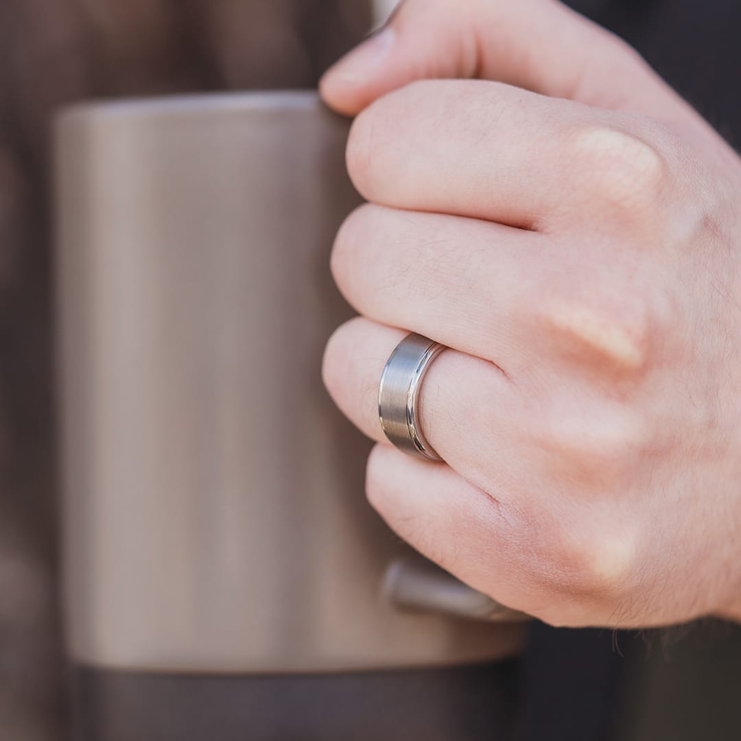 silver tungsten wedding ring called the excalibur