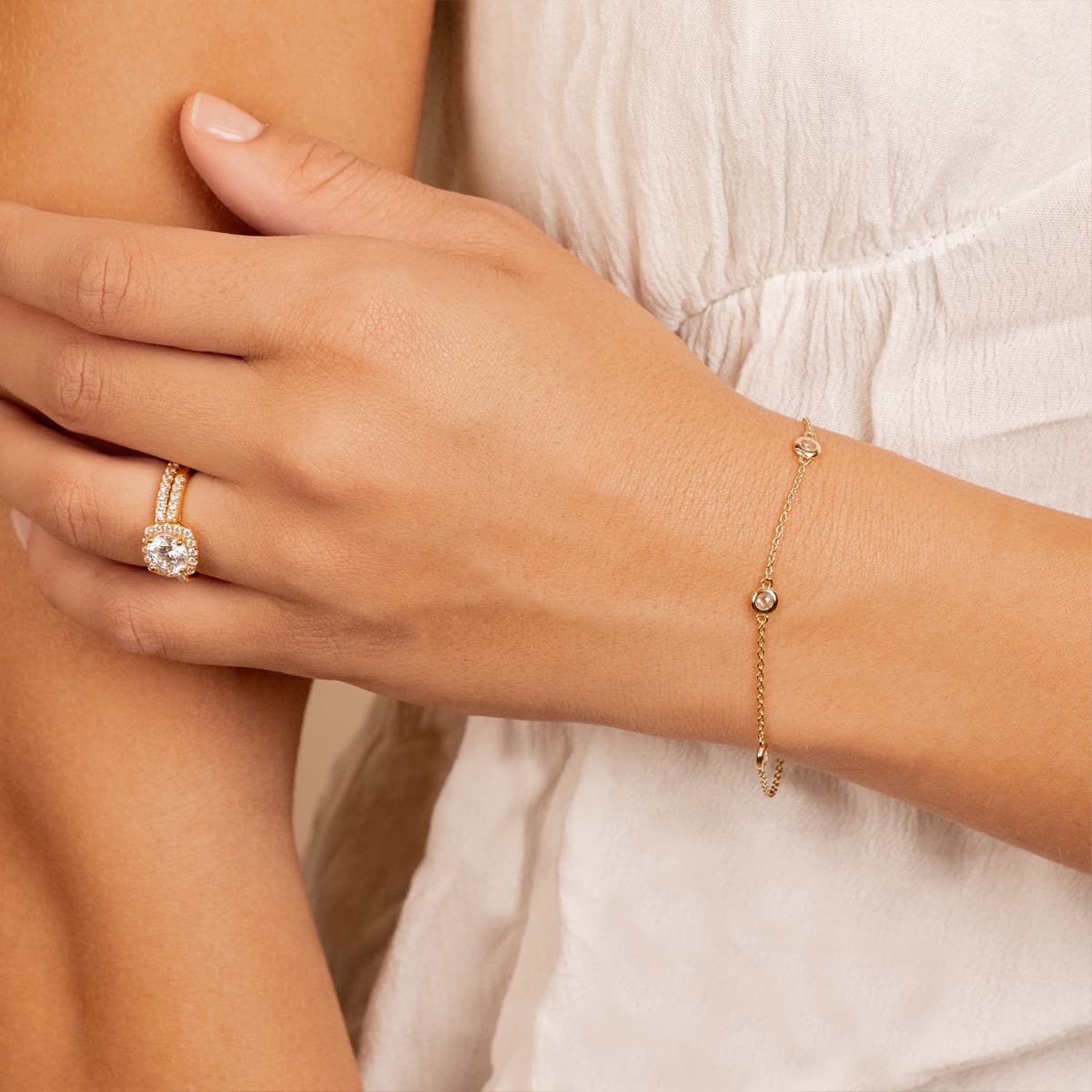 Simple gold chain bracelet with stones