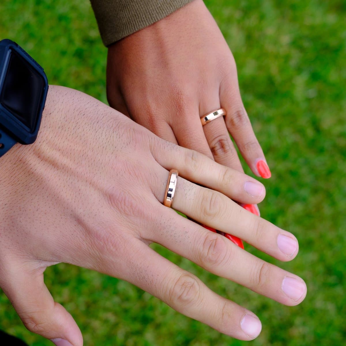 couples wearing the infinity wedding ring