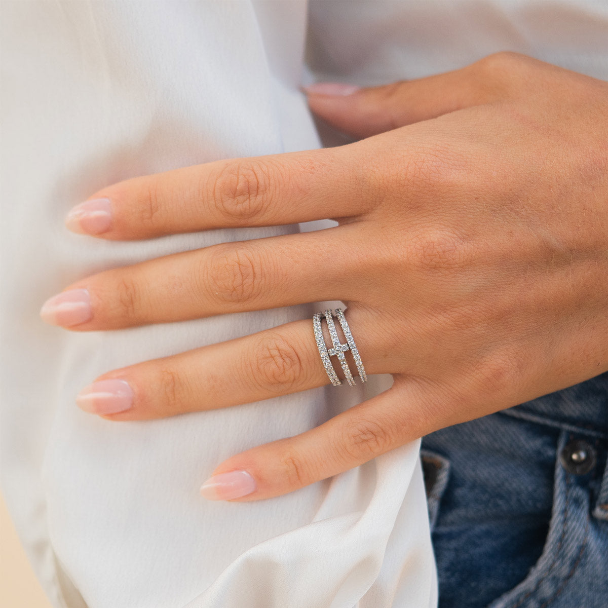 Woman wearing wedding band stack