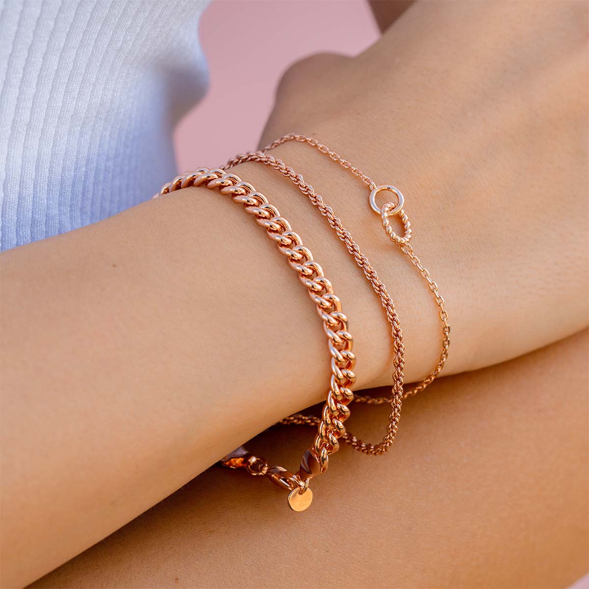 Rose gold bracelet stack on woman