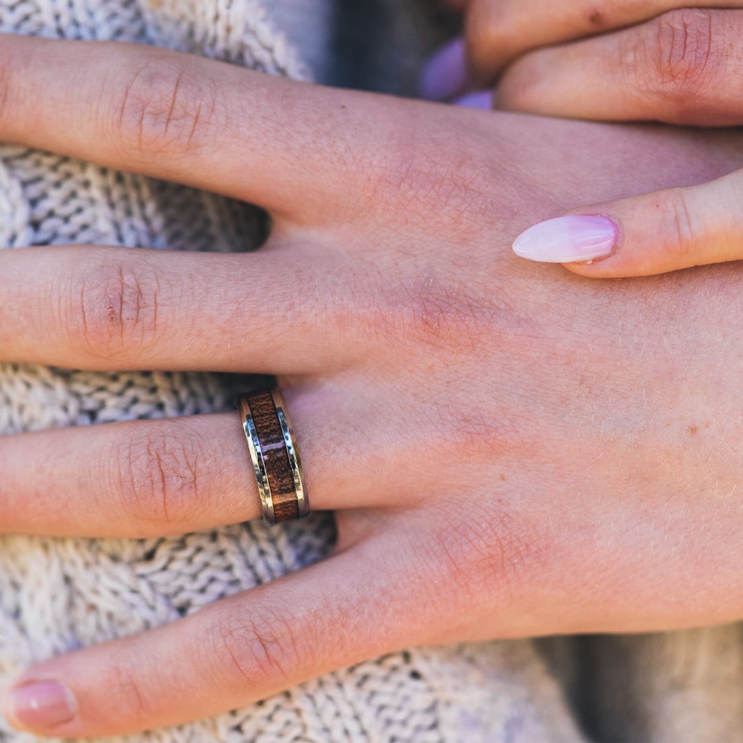 guy wearing the woodsman steel wedding band with wood inlay