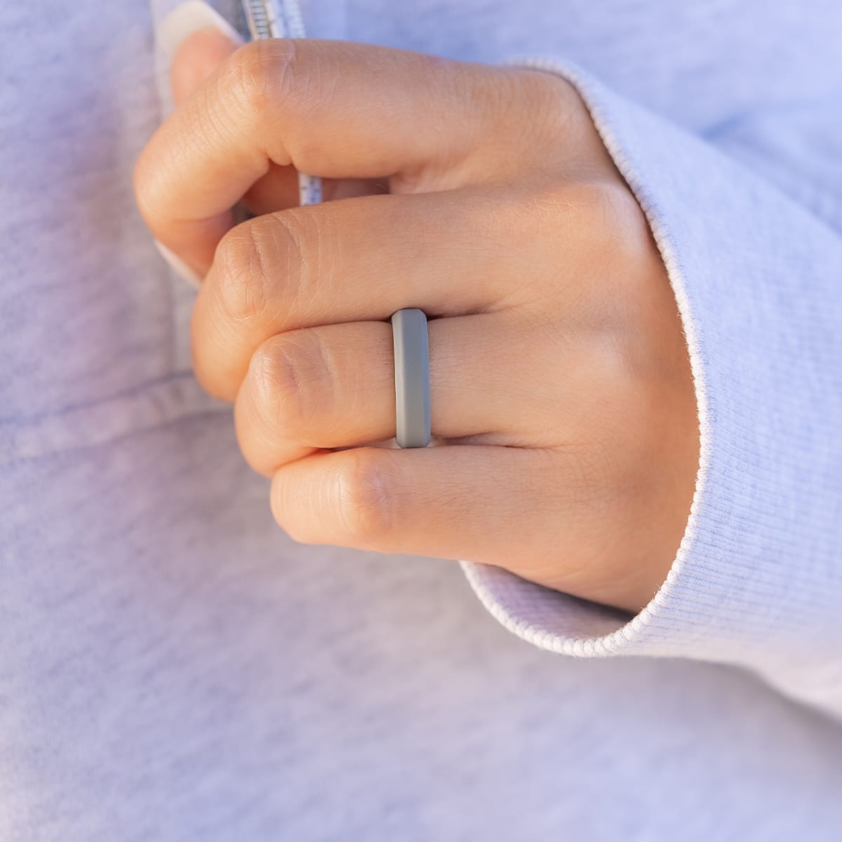 Unique and versatile rubber wedding ring on a female hand