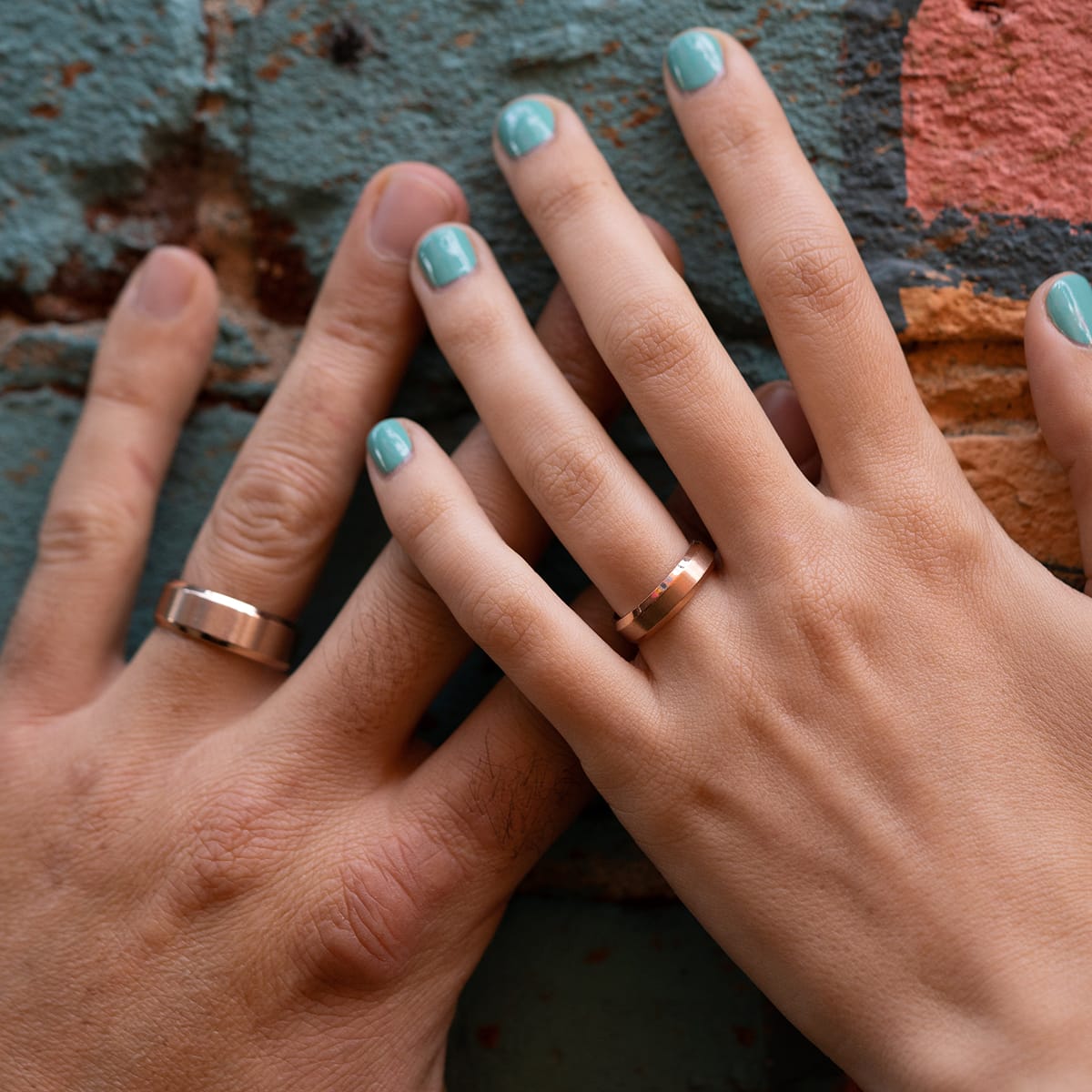 the infinity rose gold wedding band on hand