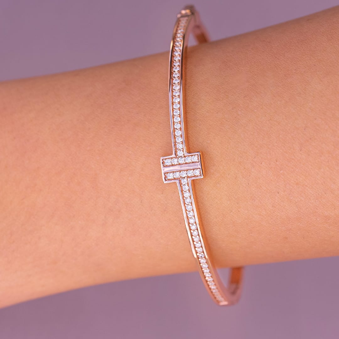 rose gold bracelet on arm