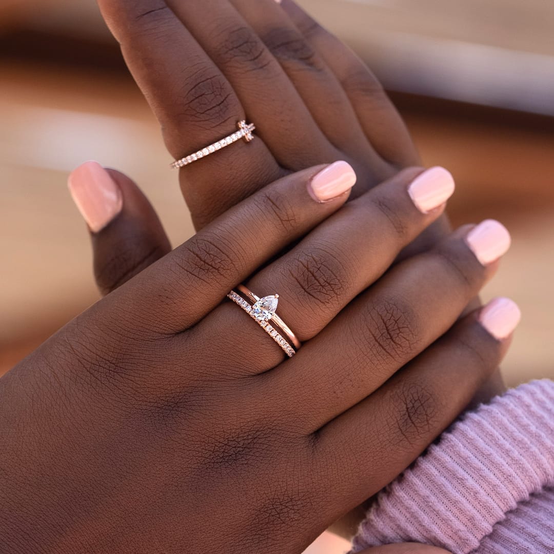 the daisy pear cut rose gold engagement ring