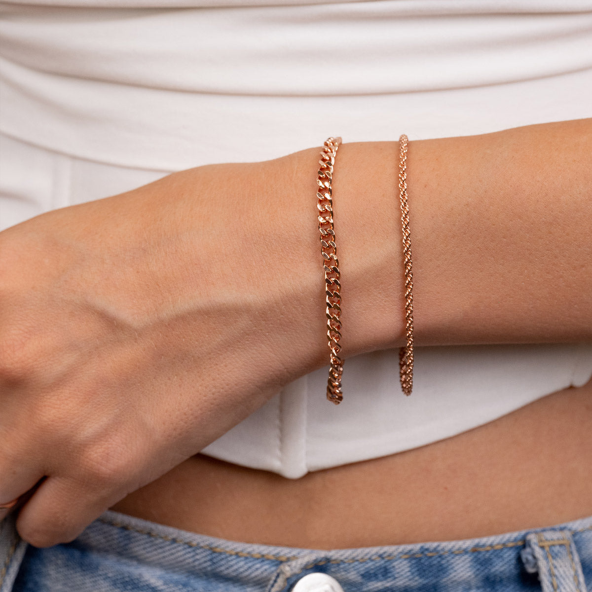 Layered rose gold chain bracelets