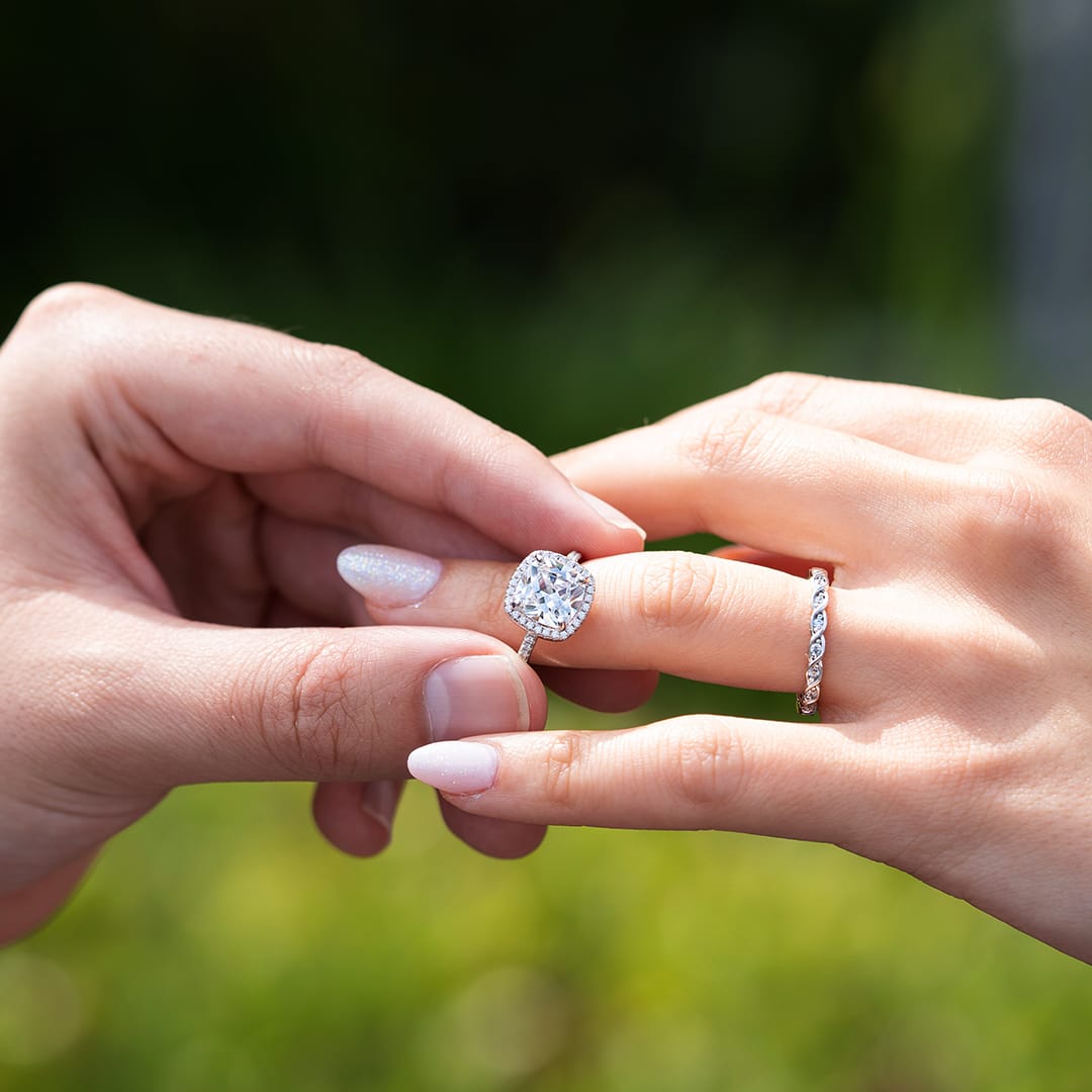 guy placing rings on finger