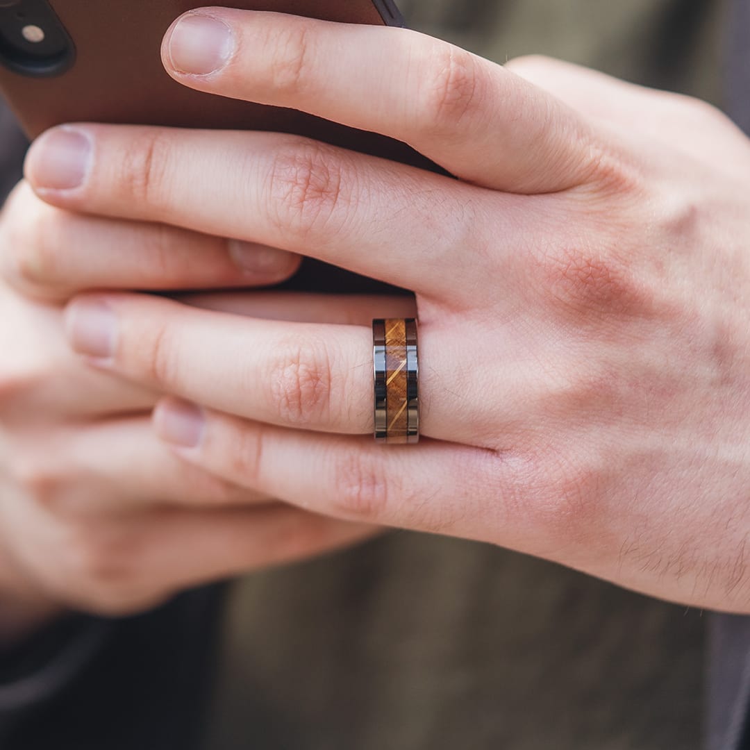 the bourbon tungsten ring with whiskey barrel inlay